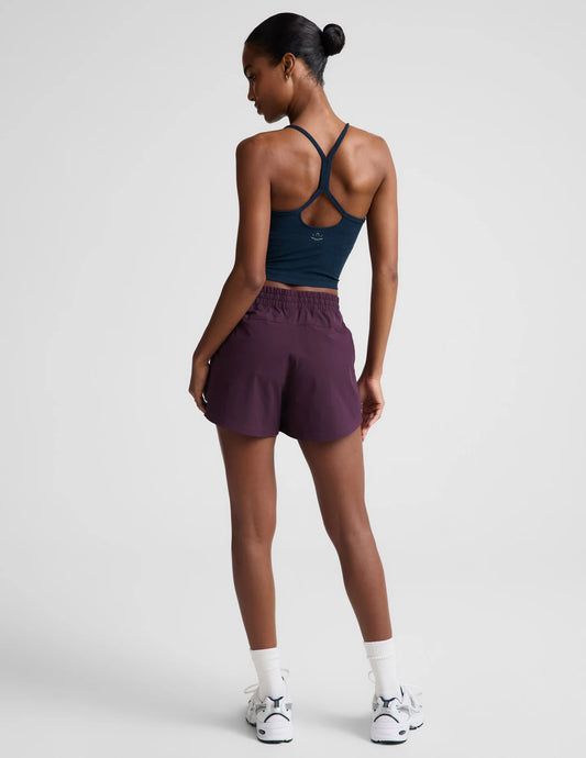 Peak 3" Short by Beyond Yoga | Brilliant Blackberry