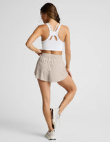 Solemate 2.5” Short by Beyond Yoga | Oat