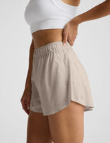 Solemate 2.5” Short by Beyond Yoga | Oat