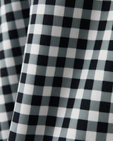 Course to Court Pocket Skort 16” by Rhone | Black Gingham