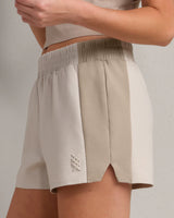 Dreamglow Color Block Short by Rhone | Beige Stone