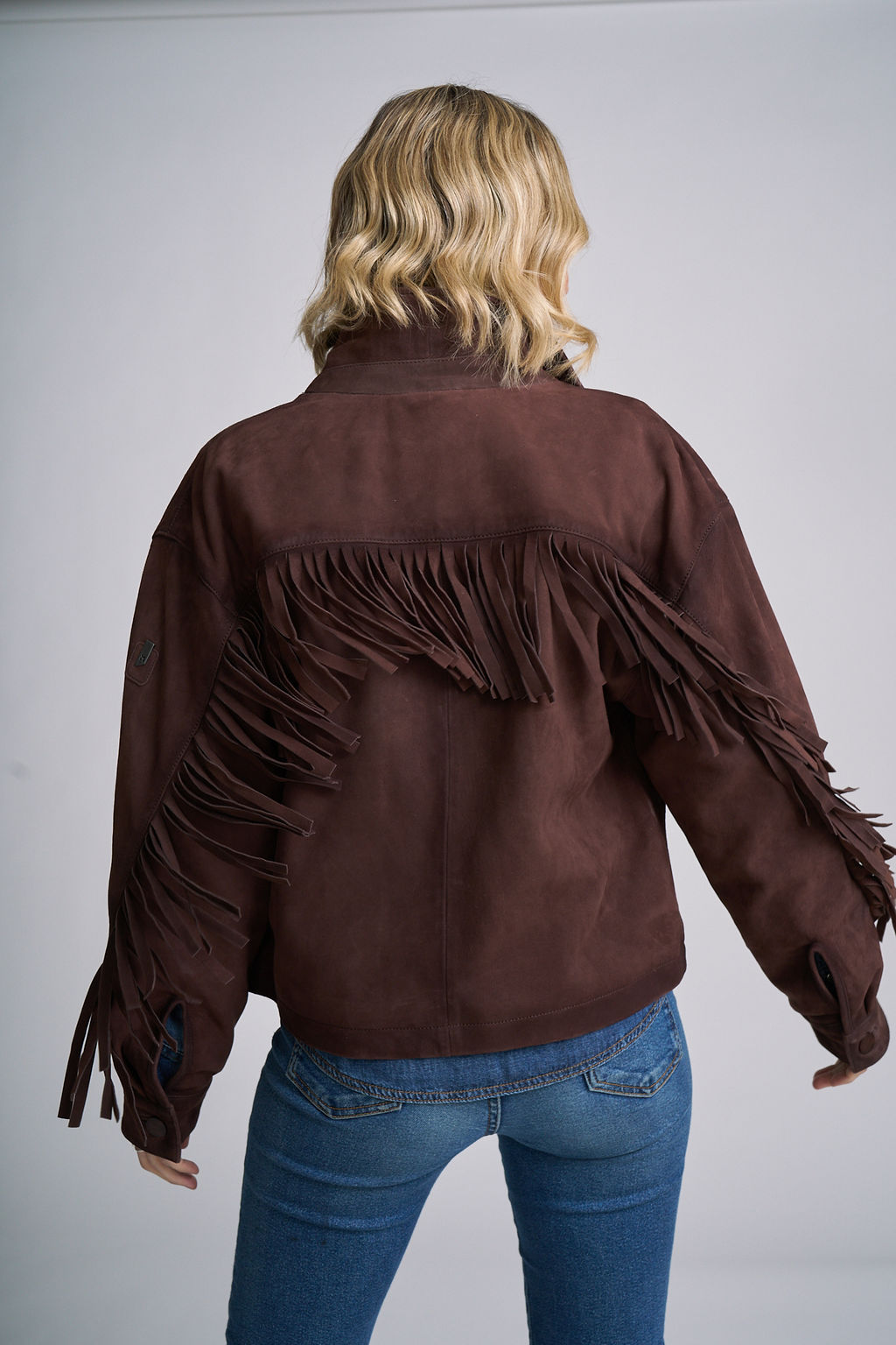 Melissa OS suede shirt jacket styled with denim