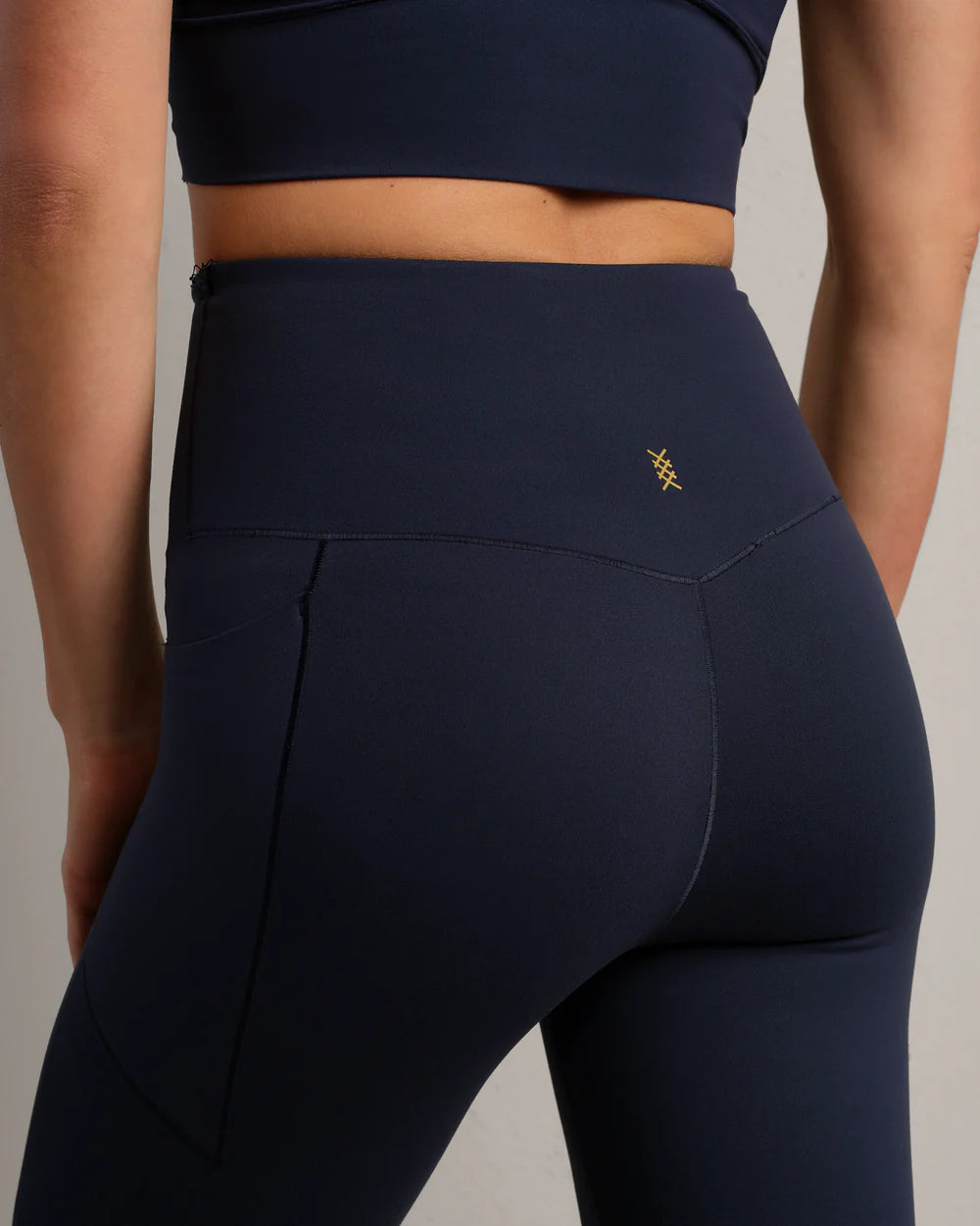 Heather Revive 7/8 Pocket Legging by Rhone | Navy Heather