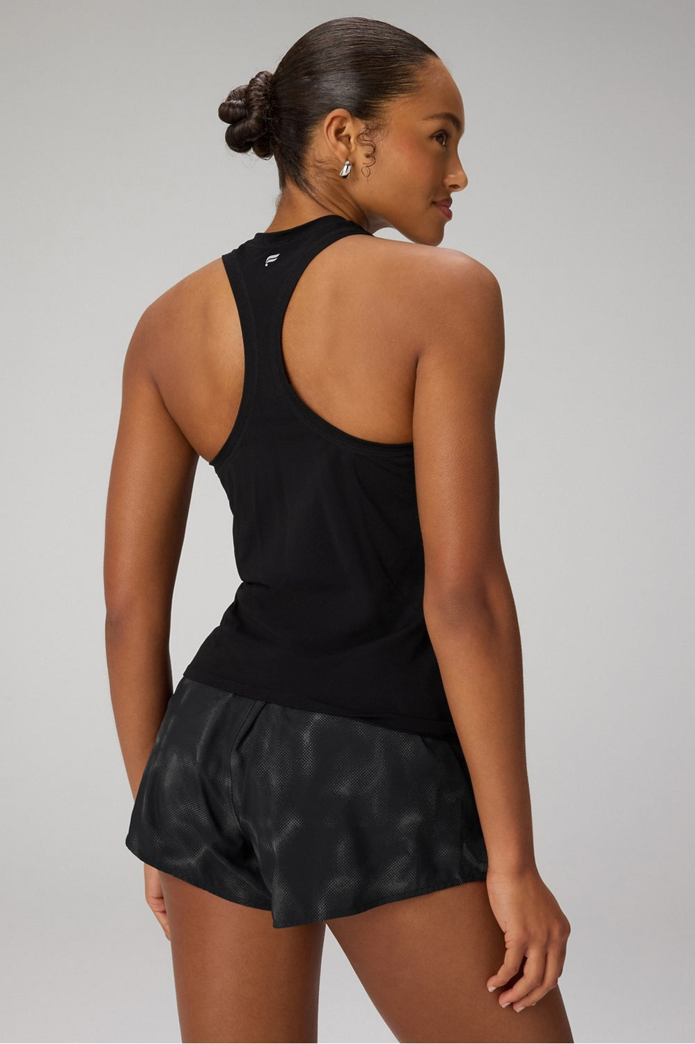 Feather Tech+ Racerback Tank by Fabletics | Black