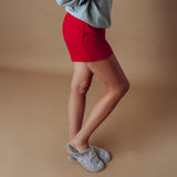 Wrigley Fur Slipper in Dusk, worn with lounge shorts