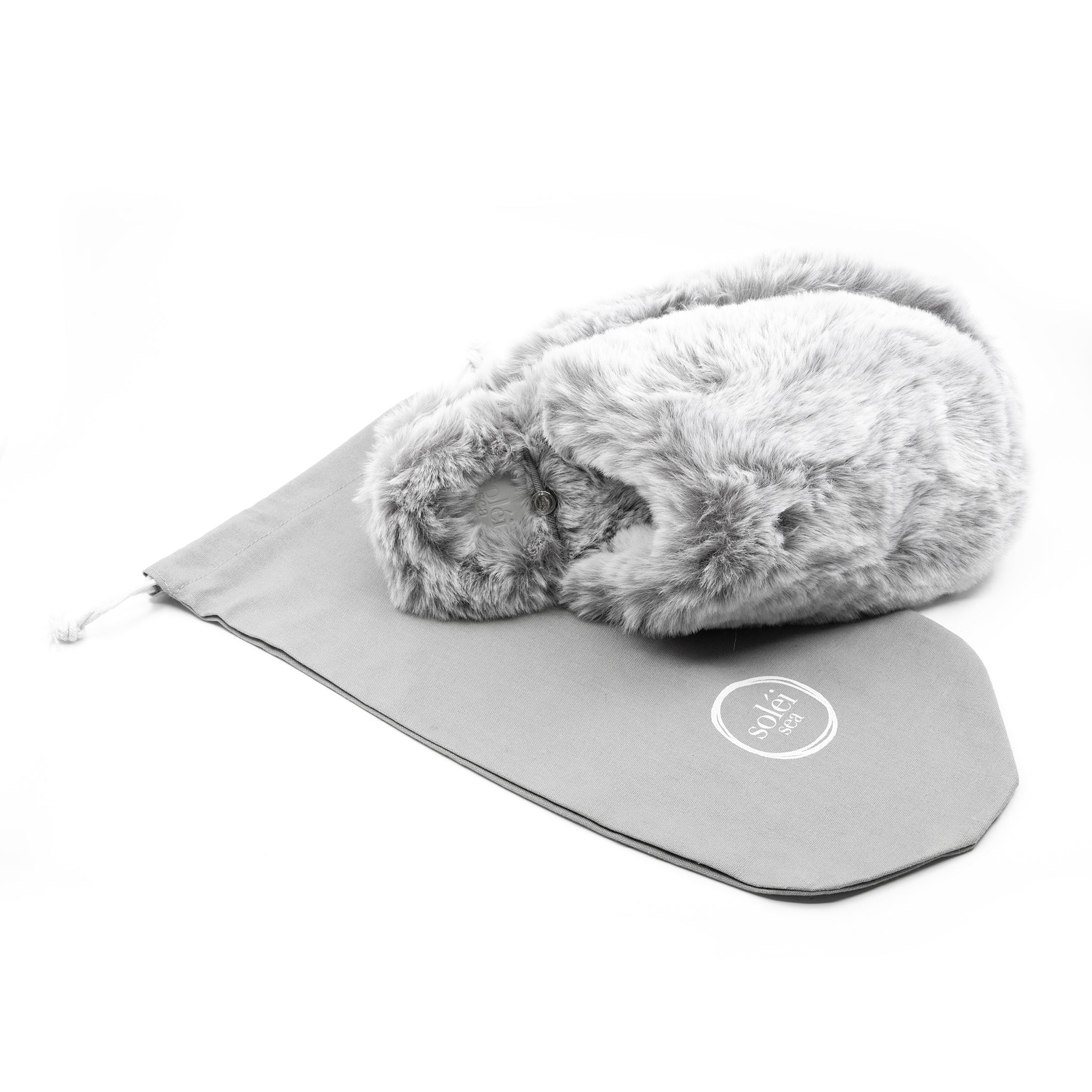 Wrigley Fur Slipper in Dusk with its reusable cotton drawstring bag