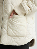 Roam Quilted Reversible Jacket by Beyond Yoga | Bone/Riverbed