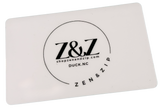 Rectangular white card with Z&Z logo and text on a white background